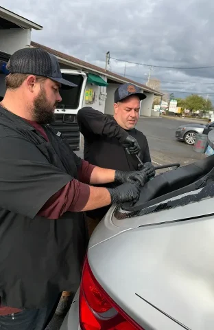 John Jr. and Chris Repairing a Rear Window #2 at Stono River Auto Glass